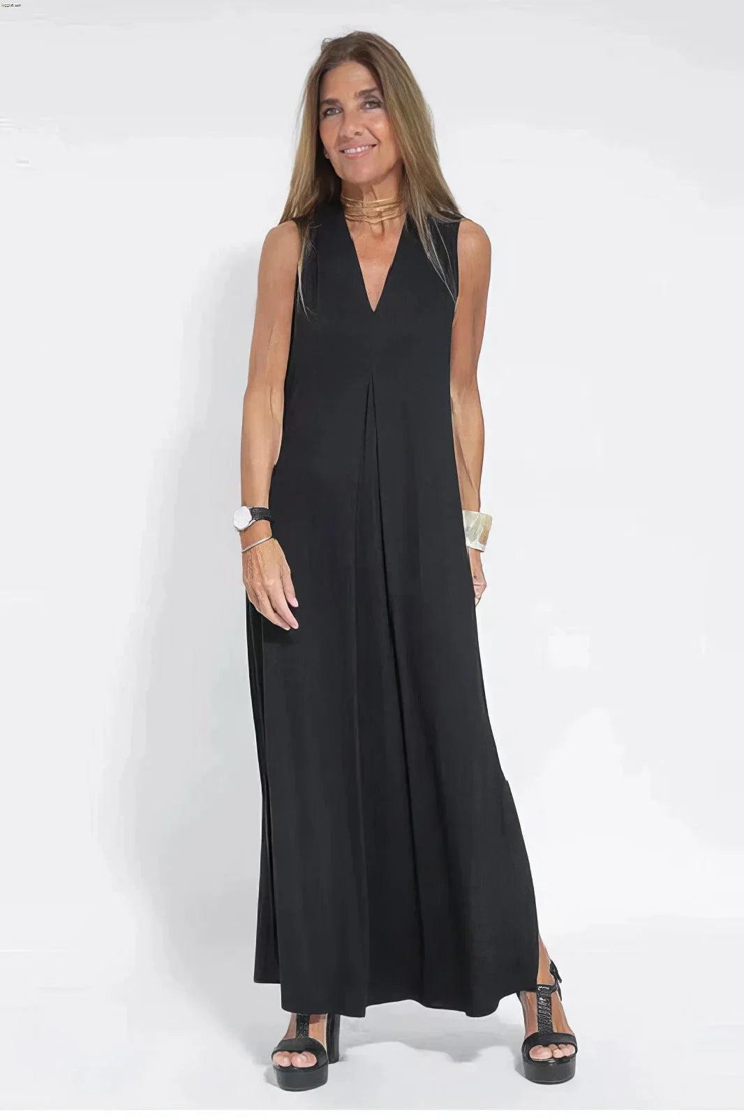 Women's knit flowy maxi dress with sleeveless V-neck and draped front